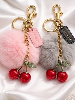 Coach hang tags Pom Pom Cherry Key Charms. Multiple colors to choose from.